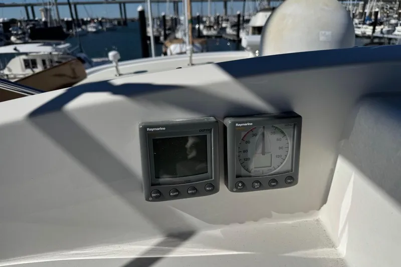 Slide: The Image of Raymarine instruments on 2008 Kadey-Krogen 44 Walk Around yacht, docked at marina. - 14