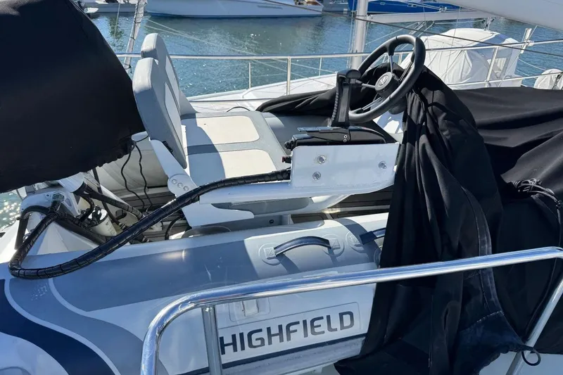 Slide: The Image of 2008 Kadey-Krogen 44 Walk Around yacht with Highfield tender, docked at marina. - 20