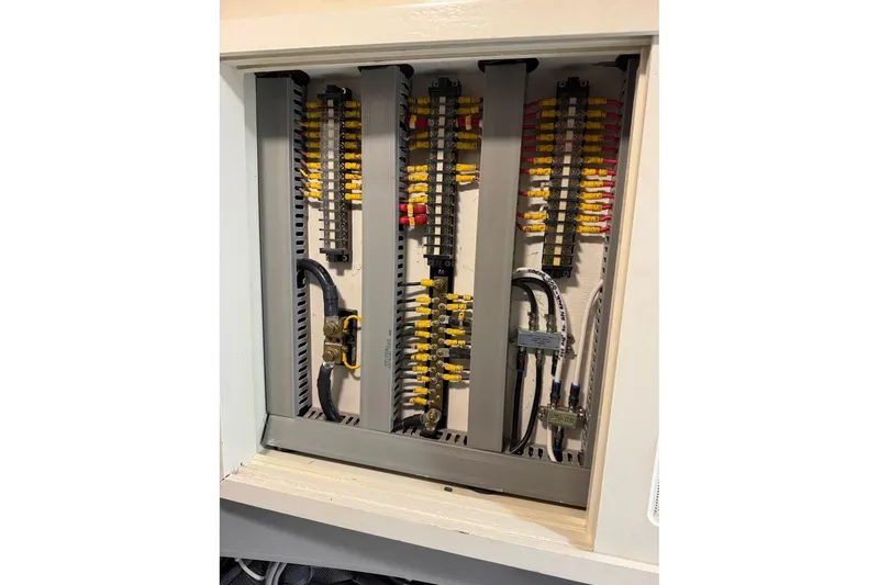 Slide: The Image of Electrical panel of 2008 Kadey-Krogen 44 Walk around boat, showcasing wiring and connections. - 56