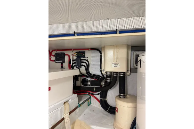 Slide: The Image of Engine room of 2008 Kadey-Krogen 44 Walk Around with visible wiring and components. - 61