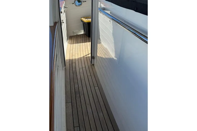 Slide: The Image of 2008 Kadey-Krogen 44 Walk Around yacht with teak deck and polished railings. - 75