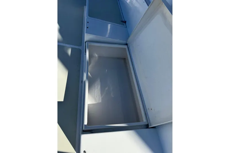 Slide: The Image of Open storage compartment on 2008 Kadey-Krogen 44 Walk Around boat deck. - 76