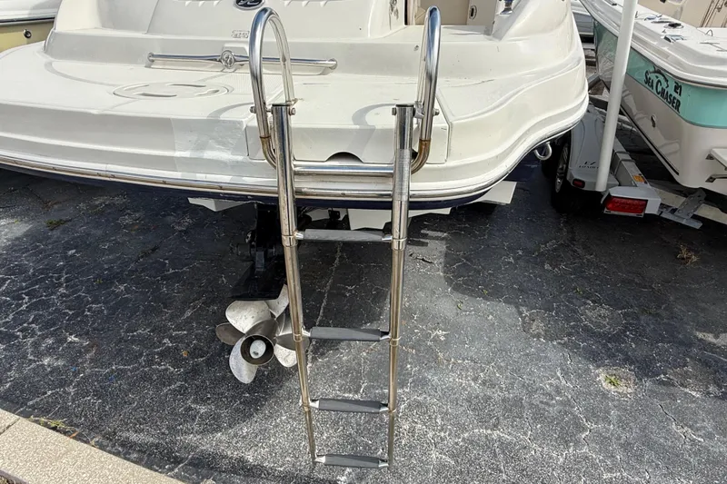Slide: The Image of Rear view of 2005 Sea Ray 220 Sundeck with ladder and propeller. - 6