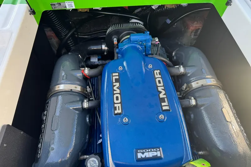 Slide: The Image of 2019 MasterCraft XT23 engine featuring Ilmor 5000 MPI, showcasing powerful marine performance. - 13
