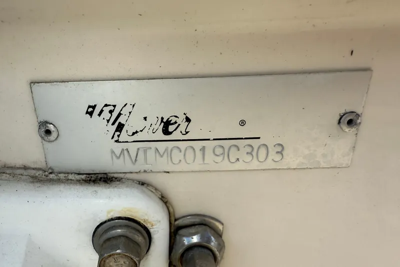 Slide: The Image of 2003 Maverick 18 Master Angler boat identification plate with serial number MVI MC019C303. - 27