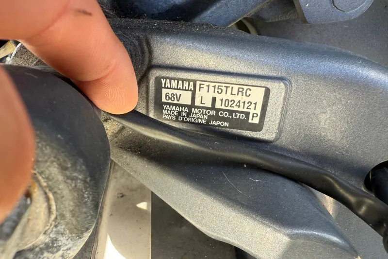 Slide: The Image of Yamaha F115TLRC engine label on 2003 Maverick 18 Master Angler boat. - 28