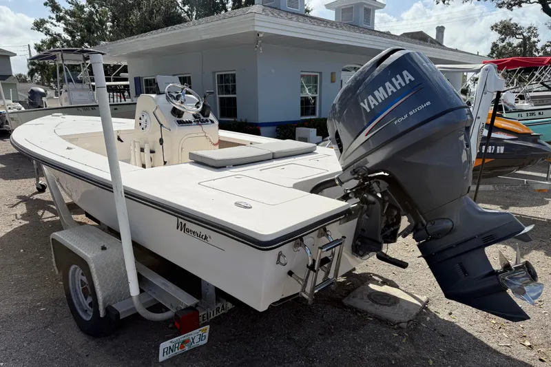 Slide: The Image of 2003 Maverick 18 Master Angler boat with Yamaha outboard motor on a trailer. - 3