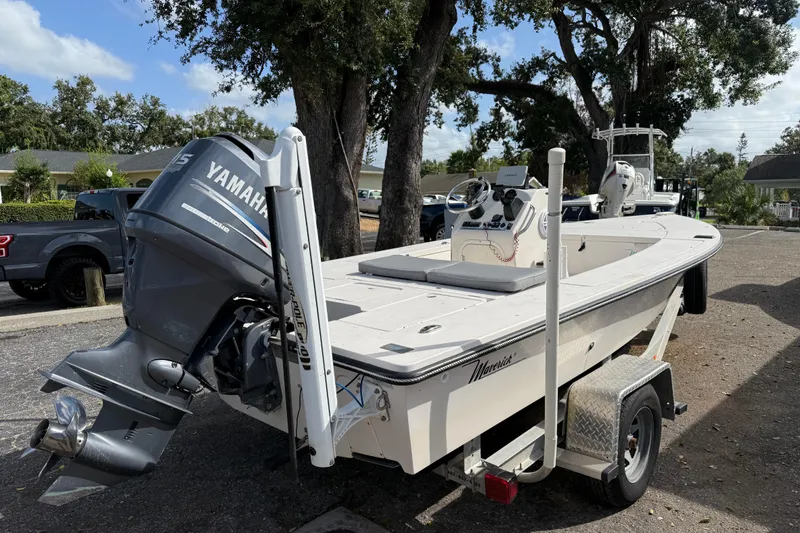 Slide: The Image of 2003 Maverick 18 Master Angler boat with Yamaha outboard motor on trailer. - 4