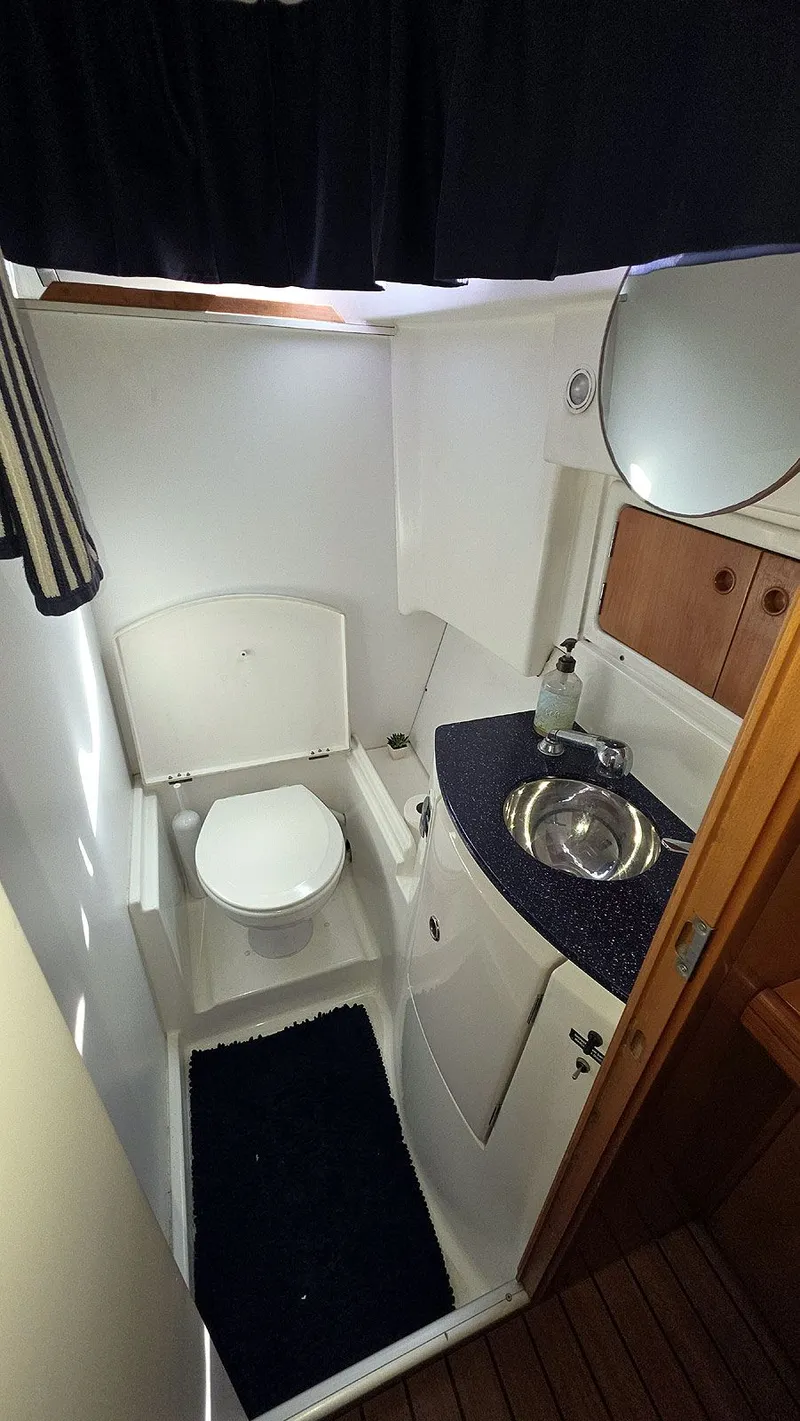 Slide: The Image of Master Head Vanity and Toilet - 31