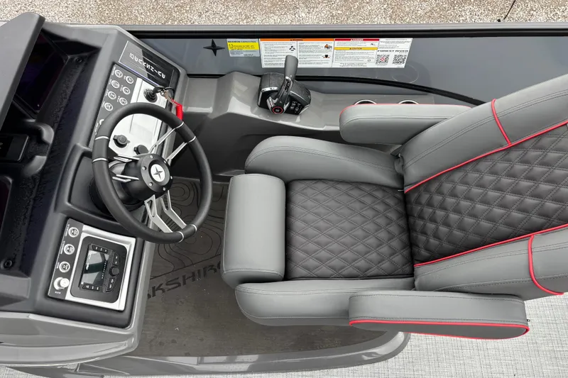 Slide: The Image of Luxurious cockpit of 2026 Berkshire 25SB2 STS with quilted seat and modern controls. - 14