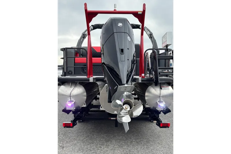 Slide: The Image of 2026 Berkshire 25SB2 STS pontoon boat rear view with motor and dual propellers. - 5