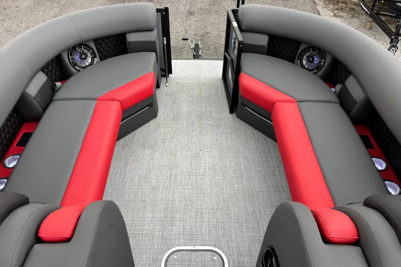 Slide: The Image of 2026 Berkshire 25SB2 STS boat interior with red and gray seating, modern design. - 8