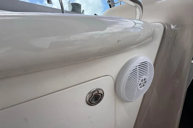Slide: The Image of Close-up of 2005 Sea Ray 300 Sundancer boat speaker and handle. - 34