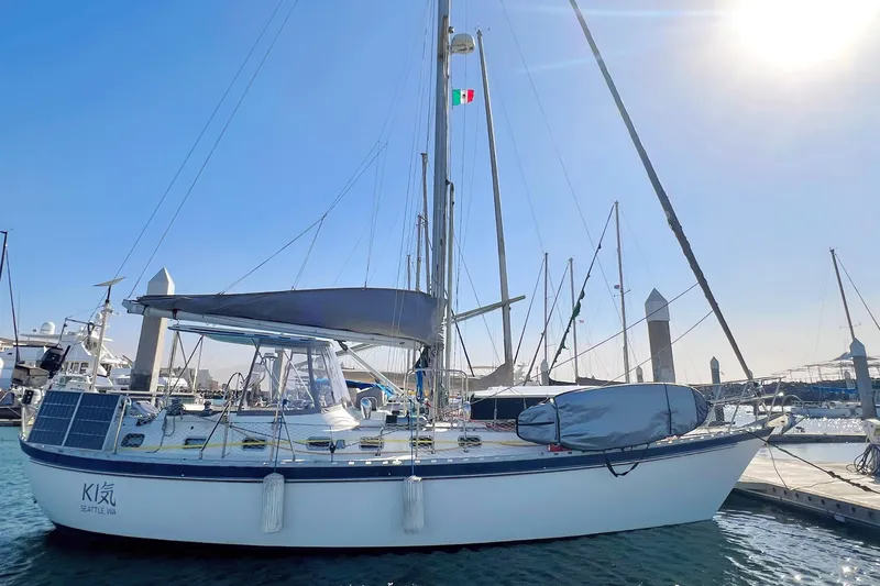 The Image of Sailboat Tayana Vancouver 42, 2001 model, docked under clear blue sky. - 0