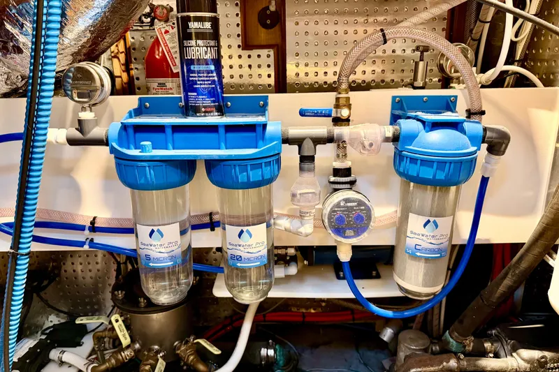 Slide: The Image of Water filtration system in a 2001 Tayana Vancouver 42 yacht engine room. - 23