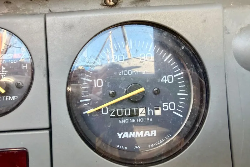 Slide: The Image of Tachometer of 2001 Tayana Vancouver 42 showing engine hours and RPM. - 25