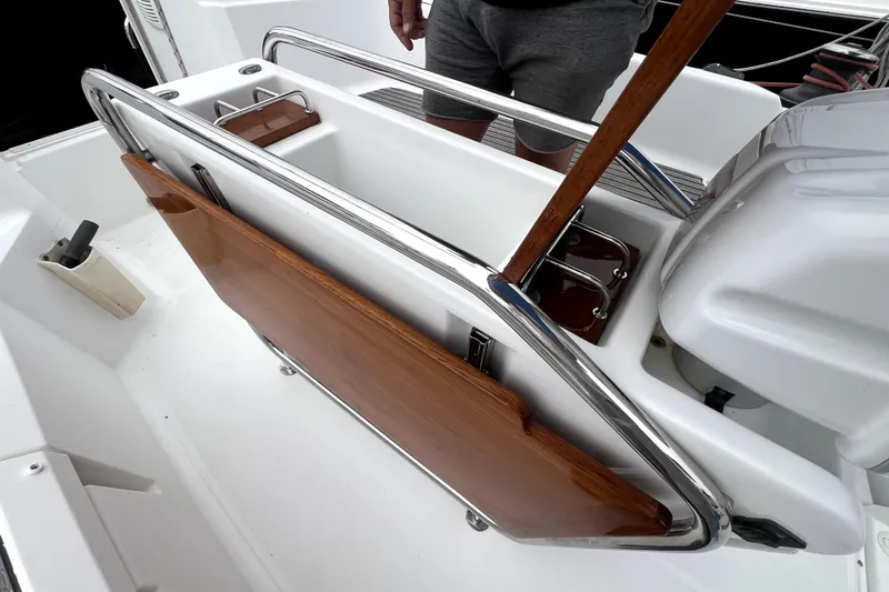 Slide: The Image of Cockpit of 2014 Jeanneau Sun Odyssey 379 sailboat with steering wheel and seating. - 13
