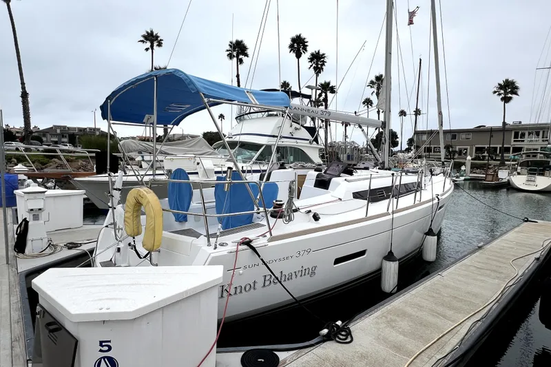 Slide: The Image of Bow of 2014 Jeanneau Sun Odyssey 379 sailboat with anchor and railing. - 17