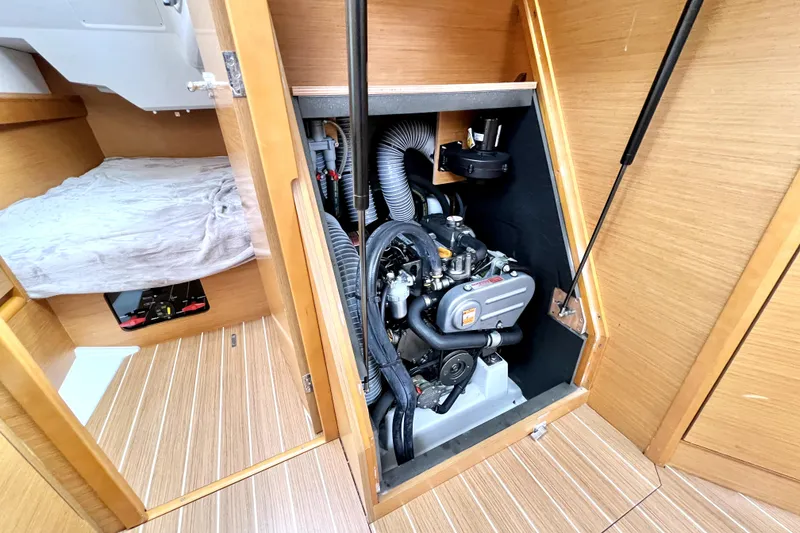 Slide: The Image of Storage area inside 2014 Jeanneau Sun Odyssey 379 sailboat with bags and equipment. - 54