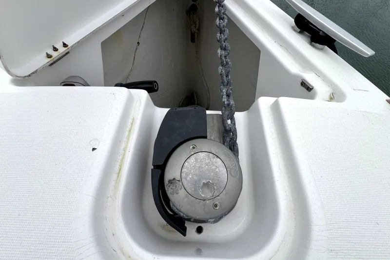 Slide: The Image of Cockpit of 2014 Jeanneau Sun Odyssey 379 sailboat, featuring sleek design and modern navigation equipment. - 8