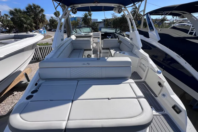 Slide: The Image of 2021 Sea Ray SDX 270 Outboard boat with spacious seating and sleek design. - 11