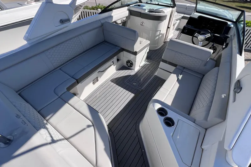 Slide: The Image of 2021 Sea Ray SDX 270 Outboard interior with spacious seating and modern design. - 19