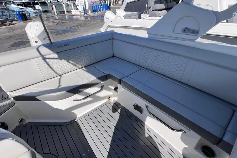 Slide: The Image of 2021 Sea Ray SDX 270 Outboard boat interior with sleek seating and modern design. - 20