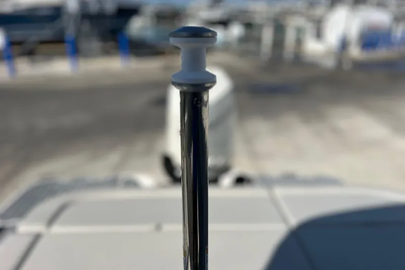 Slide: The Image of Close-up of a 2021 Sea Ray SDX 270 Outboard boat detail at a marina. - 21