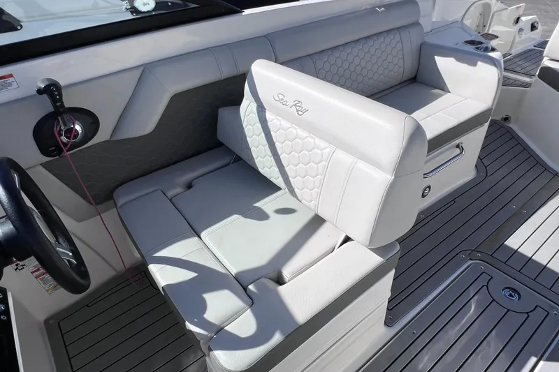 Slide: The Image of 2021 Sea Ray SDX 270 Outboard boat interior with luxurious seating and modern design. - 28