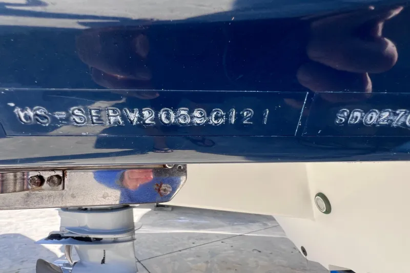 Slide: The Image of 2021 Sea Ray SDX 270 Outboard hull identification number close-up. - 55