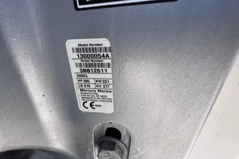 Slide: The Image of Label on 2021 Sea Ray SDX 270 Outboard, displaying model and serial numbers. - 56