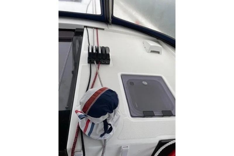 Slide: The Image of 2018 Beneteau Oceanis 45 sailboat deck with ropes and hatch detail. - 25