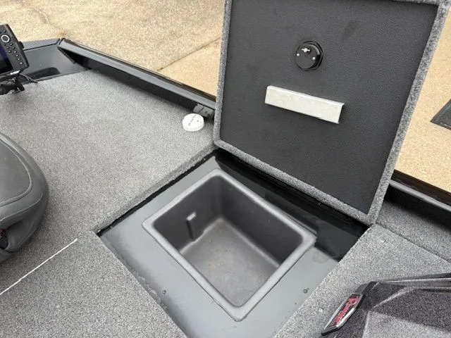 Slide: The Image of 2023 Ranger RT178 boat with open storage compartment. - 16