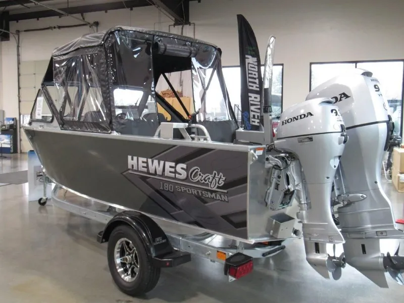 Slide: The Image of 2026 Hewescraft 180 Sportsman boat with Honda engines. - 3