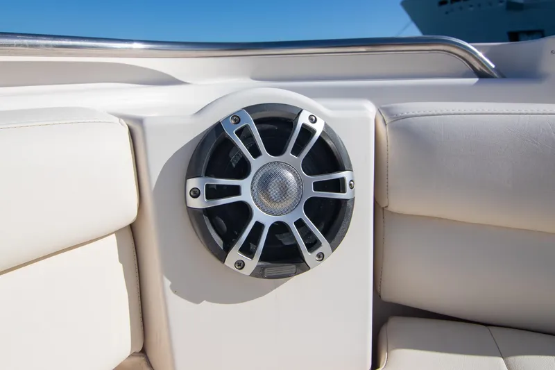 Slide: The Image of 2023 Grady-White Canyon 326 boat speaker detail with white seating. - 22