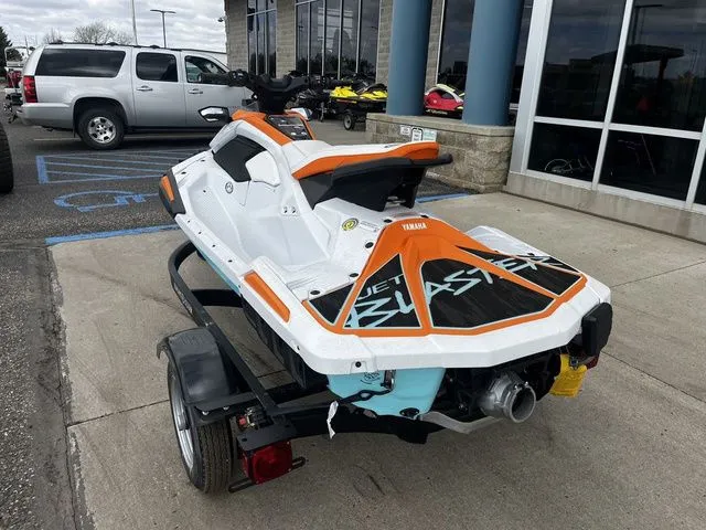 Slide: The Image of 2026 Yamaha WaveRunner JetBlaster on trailer outside a building. - 5