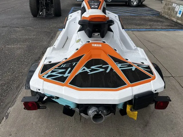 Slide: The Image of 2026 Yamaha WaveRunner JetBlaster in white and orange, rear view. - 6