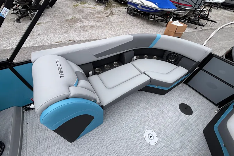 Slide: The Image of Luxurious seating on 2026 Trifecta C Series 24RFC CS pontoon boat, featuring modern design and comfort. - 10