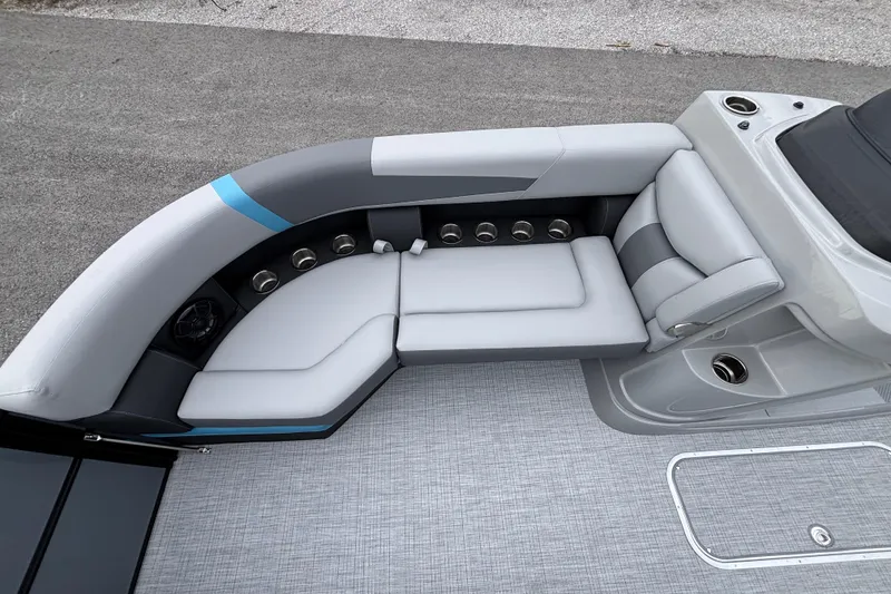 Slide: The Image of Luxurious seating on 2026 Trifecta C Series 24RFC CS pontoon boat, featuring modern design and comfort. - 7