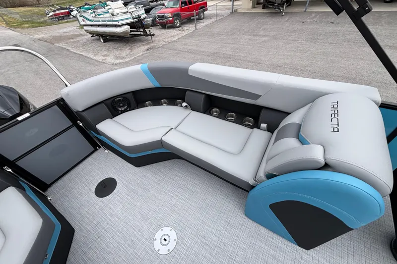 Slide: The Image of Luxurious seating on 2026 Trifecta C Series 24RFC CS pontoon boat, featuring modern design. - 9