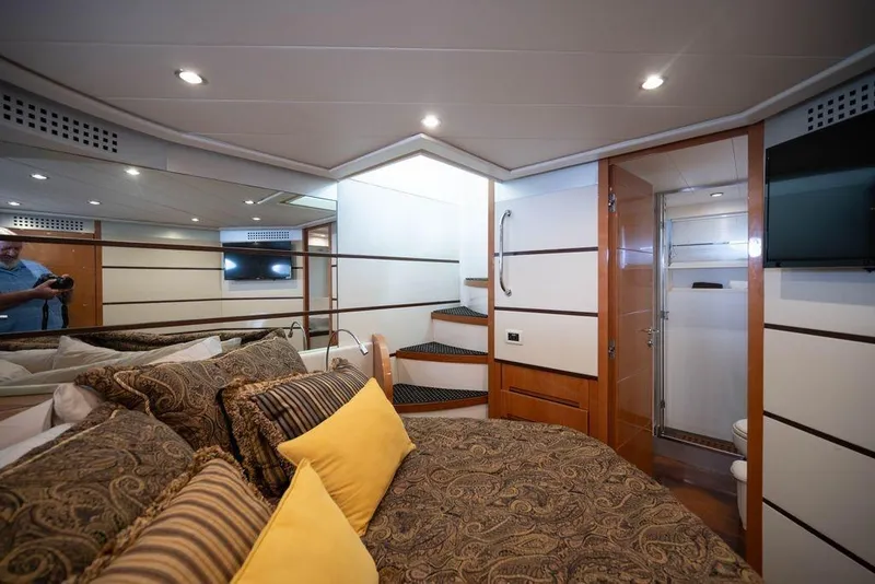 Slide: The Image of Luxurious interior of 2007 Pershing 62' yacht with elegant bedroom and modern bathroom. - 22