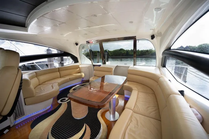 Slide: The Image of Luxurious interior of a 2007 Pershing 62' yacht with elegant seating and scenic views. - 3