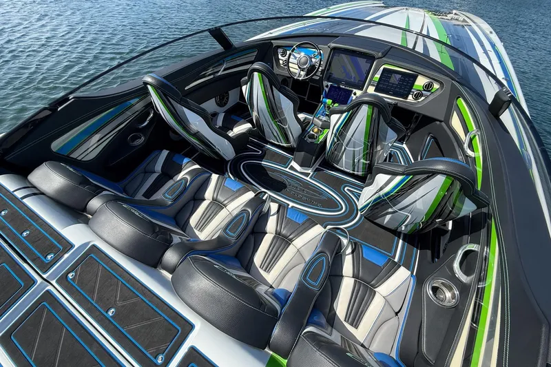 Slide: The Image of Luxurious 2022 MTI 390X boat interior with sleek seating and advanced dashboard technology. - 10