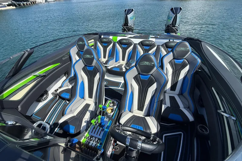 Slide: The Image of Luxury MTI 390X 2022 speedboat interior with stylish blue and gray seating. - 22