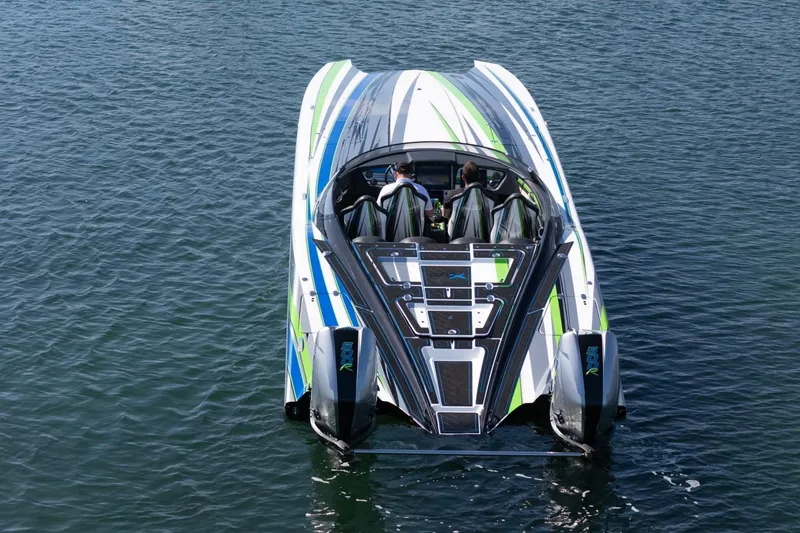 Slide: The Image of 2022 MTI 390X speedboat on water, featuring sleek design and vibrant colors. - 37
