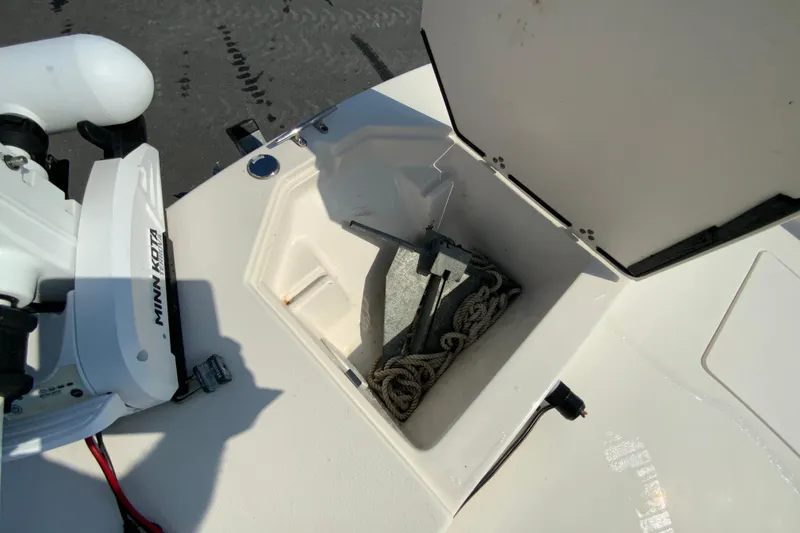 Slide: The Image of 2021 Carolina Skiff 21 LS anchor storage with Minn Kota trolling motor. - 16