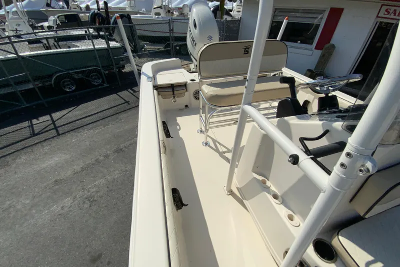 Slide: The Image of 2021 Carolina Skiff 21 LS boat interior with seating and steering console. - 19