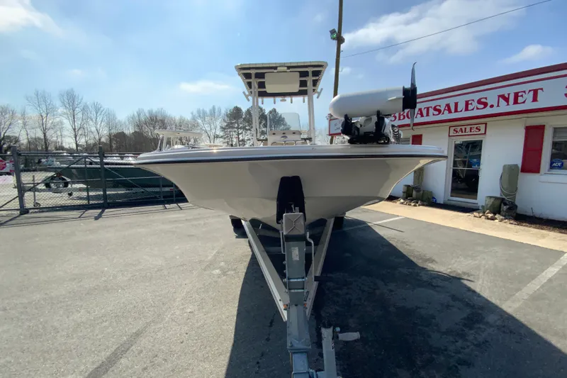 Slide: The Image of 2021 Carolina Skiff 21 LS boat on trailer at dealership, sunny day. - 4