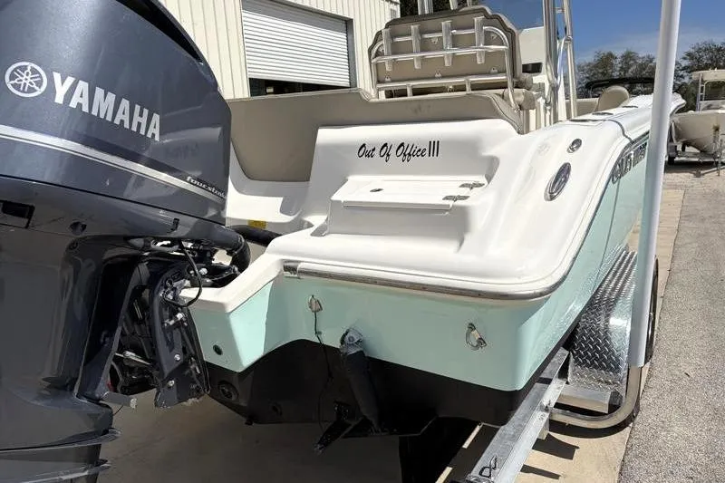 Slide: The Image of 2024 Key West 239 FS boat with Yamaha engine, labeled "Out Of Office III." - 13