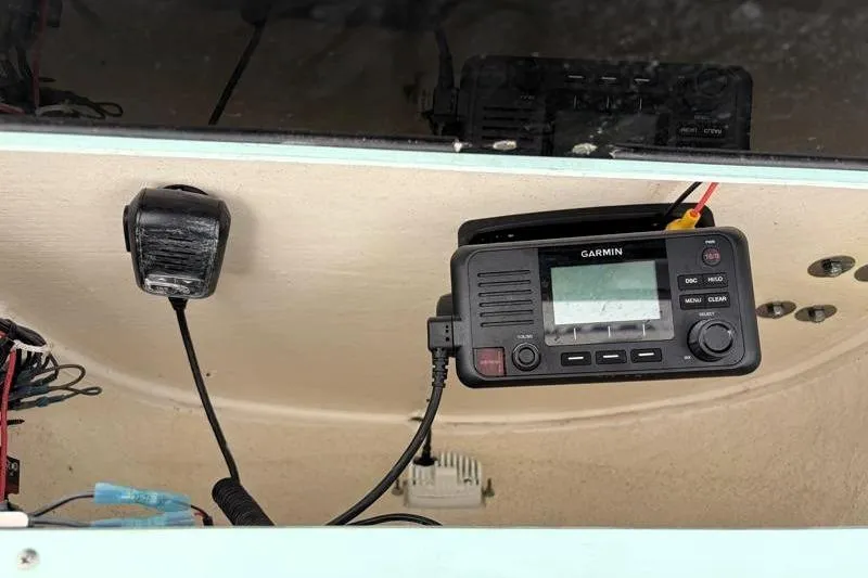 Slide: The Image of Garmin marine radio installed on 2024 Key West 239 FS boat dashboard. - 31